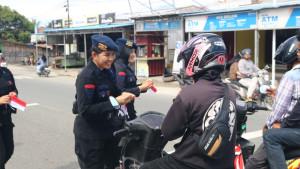 Sambut-HUT-RI-ke-80-Brimob-Sulteng-Bagikan-1000-Bendera-Merah-Putih.jpg