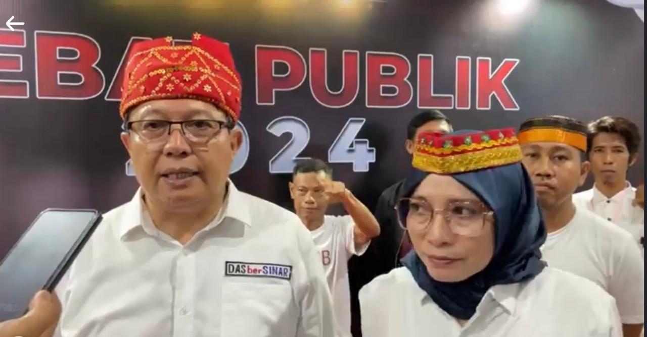 calon-Bupati-dan-Wakil-Bupati-Poso-Darmin-Agustinus-Sigilipu-dan-Samsinar-Z.jpg