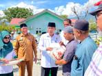 319-Kamu-Dhuafa-di-Kecamatan-Palu-Barat-Terima-Bantuan-Rp186-Juta-dari-Baznas-Kota-Palu.jpg