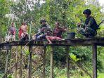 Anggota-Satgas-Pamtas-RI-PNG-Yonif-711Rks-Pos-Arso-Tami-melaksanakacd.jpg