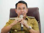 Bupati-Sigi-Mohamad-Irwan-memimpin-rapat-untuk-membahas-pembandsdf.jpg