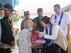 Bupati-Verna-bagikan-pangan-di-desa.jpg