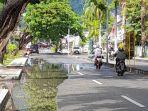 GENANGAN-AIRGenangan-air-merendam-sebagian-badan-jalan-ds.jpg