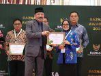 Sekkot-Palu-Irmayanti-Pettalolo-dan-Ketua-Baznas-RI-Kh-Noor-Achmad.jpg