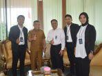 Wali-Kota-Palu-Hadianto-Rasyid-menerima-kunjungan-Bank-BTN-KCf-ffffdf.jpg