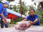 YMKI-Bagi-Daging-Kurban-di-Sigi-dan-Donggala.jpg