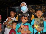 aksi-cepat-tanggap-palu-menggelar-kegiatan-pembagian-wakaf-al-quran.jpg