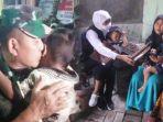 dua-anak-prajurit-tni-yang-gugur-di-papua-sertu-eka-andriyanto-hasugian.jpg