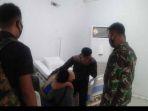 dua-anggota-tni-au-selamatkan-pasien-covid-19-dalam-upaya-bunuh-diri.jpg