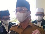 irwan-lapata-pakai-baju-dinas.jpg