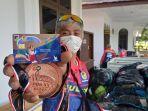 kartu-atm-bank-sulteng-yang-didesain-khusus-untuk-atlet-sulteng-peraih.jpg