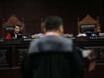 ketua-mahkamah-konstitusi-anwar-usman-memimpin-sidang-perdana.jpg