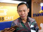 komisioner-kpu-ri-pramono-ubaid-tanthowi-saat-menemui-wartawan.jpg