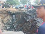 lubang-besar-yang-terjadi-di-jalja-wolter-monginsidi-palu-jumat-692019-sore.jpg