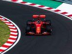 pembalap-ferrari-sebastian-vettel-di-f1-hungaria.jpg