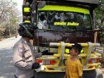 polisi-tilang-anak-kecil-yang-kendarai-truk-tronton.jpg