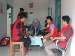 salah-satu-posko-pelayanan-yang-didirikan-di-lokasi-banjir-bandang-di-desa-bulapapu.jpg