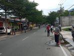 trc-dlh-palu-bersihkan-jalan.jpg