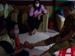 wali-kota-palu-hadianto-rasyid-sedang-dipijat.jpg