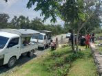 warga-dari-kabupaten-sigi-saat-berziarah-ke-kuburan-massal-di-poboya-palu.jpg