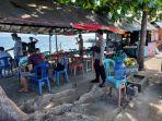 wisata-pantai-kilometer-5-di-jl-trans-sulawesi-kelurahan-maad.jpg