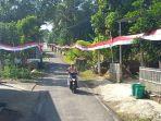 eorang-warga-melintas-di-jalan-kampung-RT-R-RW-5-De.jpg