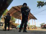 kpk-korupsi-dpu-pr-banjarnegara-polisi-berjaga.jpg