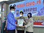 pns-pemkab-tegal-sumbang-beras.jpg
