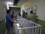 polisi-merazia-kos-kosan-yang-diduga-menjadi-tempat-prostitusi-di.jpg