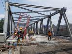 progres-pembangunan-jembatan-rembun-yang-amblas-pada-kamis-422021-s.jpg