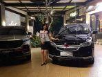sales-wuling-ajm-menunjukkan-mobil-wuling-tipe-cortez-ct-kanan.jpg