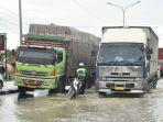 sungai-rambut-meluap-jalur-pantura-macet.jpg