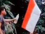 tangkapan-layar-video-yang-memperlihatkan-seorang-pemuda-membakar-bendera-merah-putih.jpg