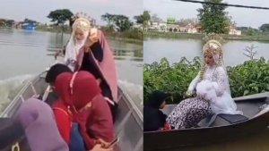 pengantin-wanita-naik-perahu-menuju-kua.jpg