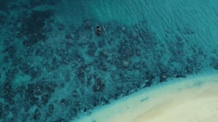 Perairan-di-Pulau-Liki-di-Kabupaten-Sarmi-Papua.jpg