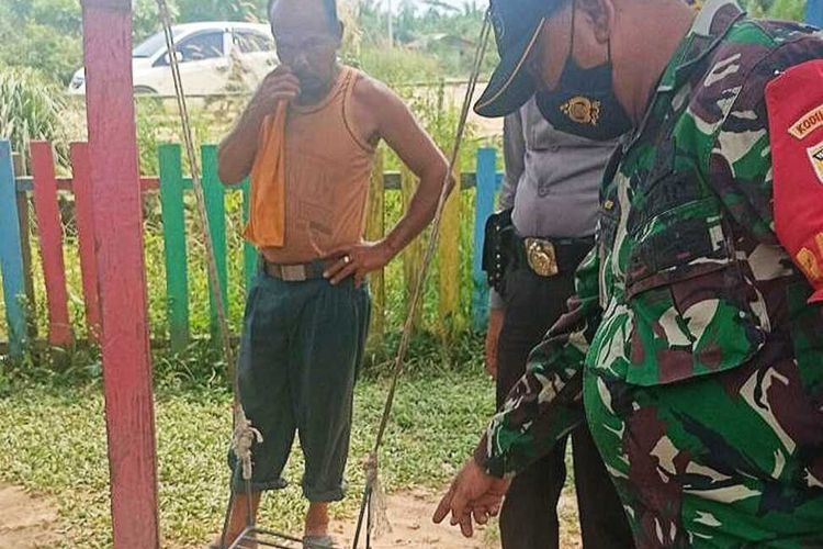 anggota-tni-dan-polisi-saat-mengamankan-pelaku-pembunuhan.jpg