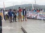 Aliansi-Masyarakat-Orang-Asli-Papua-dan-Mahasiswa-Ora.jpg