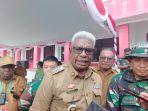 Bupati-Mimika-Johannes-Rettob-sekigus-Ketua-Panitia.jpg