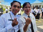Dua-tenaga-pendidikan-P3K-Nabire-Igle.jpg