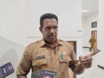 Kepala-Dinas-Perdagangan-dan-Perindustrian-Disperindag-Kabupaten-Jayapura-Theopolilus-Tegaid.jpg