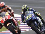 egenda-balap-MotoGP-Valentino-Rossi-kanan-dalam-sebuah-kom.jpg