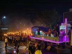 Rayakan Kemenangan Yesus Kristus, Umat Kristiani Pawai Obor Paskah Keliling Kota Timika