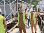 Hermus-Indou-dan-Ferdy-Laleno-meninjau-lokasi-pembangunan-46-rumah-untuk-nelayan.jpg