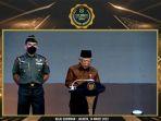 Maruf-Amin-dalam-berpidato-pada-seremoni-UHC-Award-2023.jpg