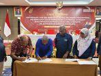 Penandatanganan-berita-acara-jadwal-kampanye-paslon-DOAMU.jpg