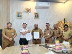 Penandatanganan-rencana-kerja-antara-Pemkab-Manokwari-dengan-BPJS-Kesehatan.jpg