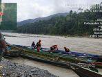 Satu-excavator-mesin-pengeruk-jatuh-ke-dalam-Bendungan-Warior.jpg