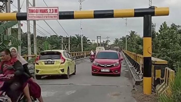 OTT KPK di PUPR Riau, Bagaimana Nasib Pembukaan Jembatan Ujung Batu Rohul untuk Semua Kendaraan?