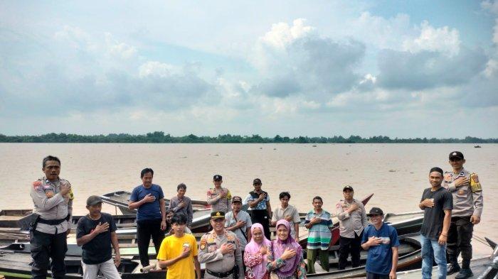 Pasca Sidang Pleno Pilkada 2024, Kapolsek Tempuling Imbauan Kamtibmas di Dermaga Sungai Salak