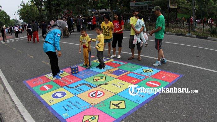 Kampanyekan Keselamatan Lalu lintas Polresta Pekanbaru Gandeng Millennial di Area Car Free Day